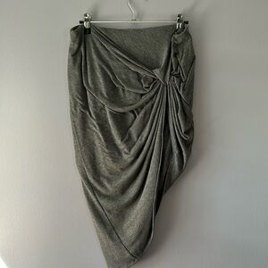 Gray body con skirt with knot detail on front. Under skirt
